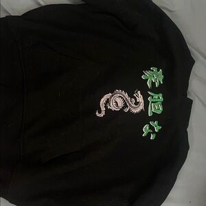 Black Hoodie with Green and White Dragon Design